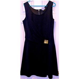 DKNY Black Dress with gold buckle cinch, size 12. Great Condition.